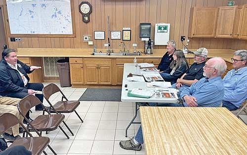 Bryan Bainbridge, left, chief executive officer of the Great Lakes Inter-Tribal Council, addresses the members of the Cassian planning commission on Monday, Nov. 20, 2023. The commission members are, from left, Mike Hempe, Sharon Kremsreiter, John Schaub, Chip Bromann and Dave Priegnitz. (Photo by Brian Jopek/Lakeland Times)