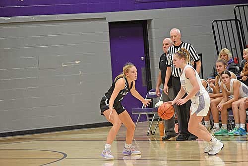 Ali Timmerman guards Mosinee’s Britt Fitzgerald on the wing during the second half of the conference opener Tuesday, Nov. 28 at Mosinee High School. Lakeland’s defense held Mosinee to 19 points in each half. (Photo by Brett LaBore/Lakeland Times)