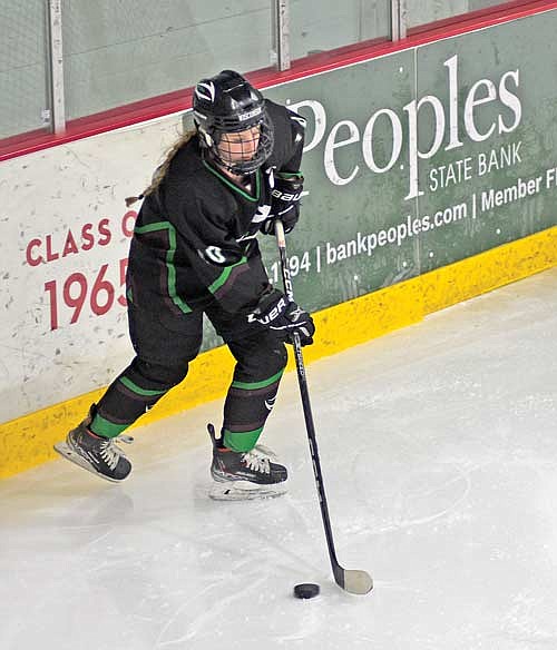In this Feb. 6, 2023 file photo, Taylor Heleniak controls the puck in a game against Northland Pines at Eagle River Sports Arena. This year, the two time all-Independent player joins Northland Pines for her senior season. (Photo by Brett LaBore/Lakeland Times)