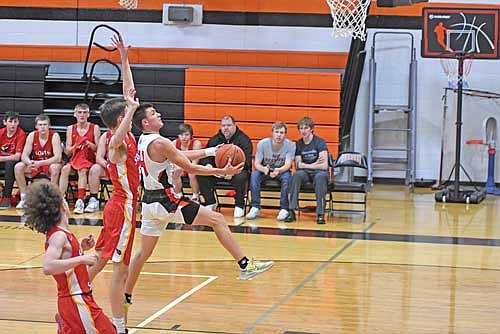 In this Jan. 27, 2023 file photo, Conrad LaBarge goes for a layup in a game against South Shore at Coach Leverson Court in Mercer. LaBarge scored 18 points in the season opener. (Photo by Brett LaBore/Lakeland Times)