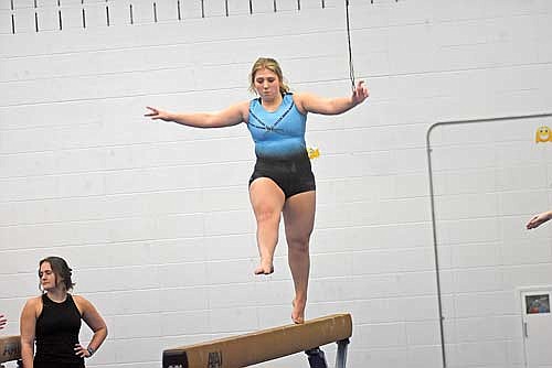 Vicky Wiza practices on the beam during the first day of practice Monday, Nov. 6 at Lakeland Union High School in Minocqua. Wiza is a captain for the 2023-24 season. (Photo by Brett LaBore/Lakeland Times)