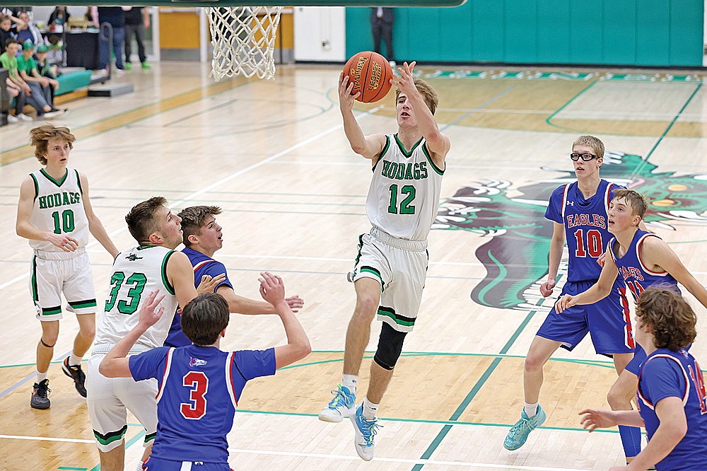 Rhinelander’s Truman Lamers rises for a layup attempt during the first half of a GNC boys’ basketball game against Northland Pines Friday, Dec. 8. The Hodags won the game, 59-47. (Bob Mainhardt for the River News)