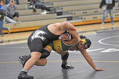 Esaube Brown tries to get Florence’s Isaiah Fennessy to the mat during a home quad Thursday, Dec. 7 at the Lakeland Union High School fieldhouse in Minocqua. (Photo by Brett LaBore/Lakeland Times)