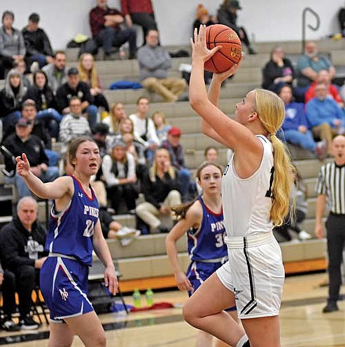 Alyssa Meade makes a basket in the second half against Northland Pines Friday, Dec. 15 at Ted Voigt Court in Minocqua. Meade had a career-high four points. (Photo by Brett LaBore/Lakeland Times)