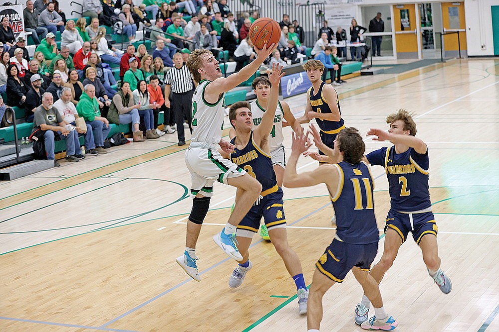 Rhinelander’s Truman Lamers drives in for a layup attempt during the first half on a non-conference boys’ basketball game against Wausau West at the Jim Miazga Community Gymnasium Tuesday, Dec. 19. Lamers scored a team-high 22 points in the Hodags’ 68-59 loss. (Bob Mainhardt for the River News)