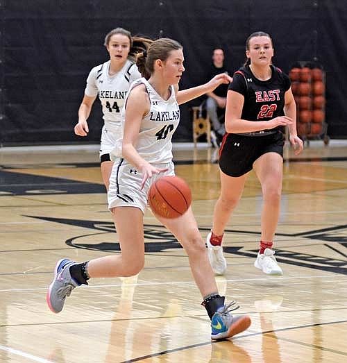 Ava Evenhouse dribbles the ball ahead of Wausau East’s Sydney Crawford and Lakeland’s Kristina Ouimette in the first half Thursday, Dec. 21 at Ted Voigt Court in Minocqua. Evenhouse had a career-high 27 points in the win. (Photo by Brett LaBore/Lakeland Times)