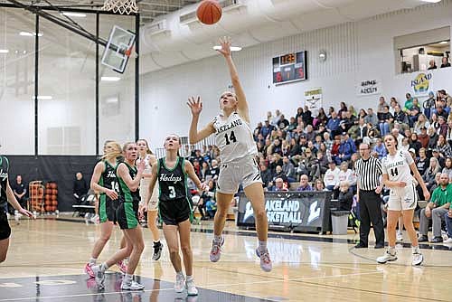 Ali Timmerman leaps for a layup attempt in the first half against Rhinelander Friday, Jan. 5 at Ted Voigt Court in Minocqua. Timmerman had a career-high 16 points. (Photo by Bob Mainhardt for the River News)