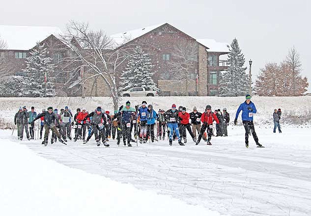 Skaters take off from the starting line of the ice skate marathon on Saturday, Jan. 6, on Lake Minocqua. There were three races, a 10K, 20K and 40K, and donations raised from the event will benefit Minocqua Winter Park. (Photo by Trevor Greene/Lakeland Times)