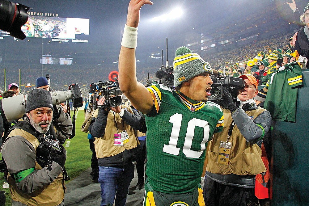 Green Bay Packers’ quarterback Jordan Love celebrates as he comes off the field following a 17-9 victory over the Chicago Bears in an NFL football game at Lambeau Field in Green Bay Sunday, Jan. 7. (Jeremy Mayo/River News)