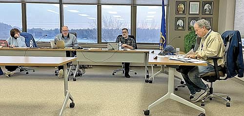 The Minocqua town board, from left, Sue Heil, Mark Hartzheim, Brian Fricke and Billy Fried during a special meeting on Tuesday, Jan. 16. (Photo by Brian Jopek/Lakeland Times)