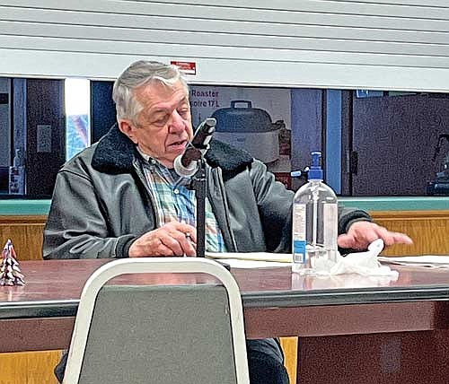 Town supervisor Carl Wolter reads an email from Manitowish Waters town chairman John Hanson during a town board meeting on Friday, Jan. 12, in Presque Isle. (Photo by Trevor Greene/Lakeland Times)