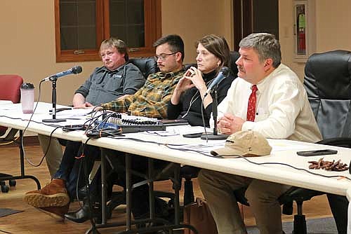 Representative Chanz Green (R-Grandview) (left), Representative Calvin Callahan (R-Tomahawk), Senator Mary Felzkowski (R-Tomahawk) and Representative Rob Swearingen (R-Rhinelander) listen to the concerns of a large crowd of hunters at a recent listening session in Woodruff regarding deer herd numbers in the north. (Photo by Beckie Gaskill/Lakeland Times)