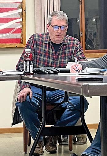 Town supervisor John Smith reads his response to a Dec. 24 complaint filed against him with town chairman Bill Felch by town supervisor Ann Sloane during a town board meeting on Tuesday, Jan. 16, in Fifield. (Photo by Trevor Greene/Lakeland Times)