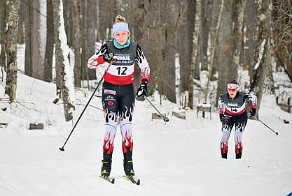 Avery McKinney skis ahead of Elsa Shockley during the Northern Conference Meet Tuesday, Jan. 23 at Birkie Trailhead in Cable. Shockley finished fourth overall and McKinney 11th. The Lakeland girls placed first as a team. (Contributed photograph)
