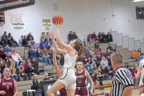 Ava Evenhouse makes a layup in the second half of an 82-28 win over Antigo Friday, Jan. 26 at Ted Voigt Court in Minocqua. Evenhouse scored 22 points with four 3-pointers. (Photo by Brett LaBore/Lakeland Times)