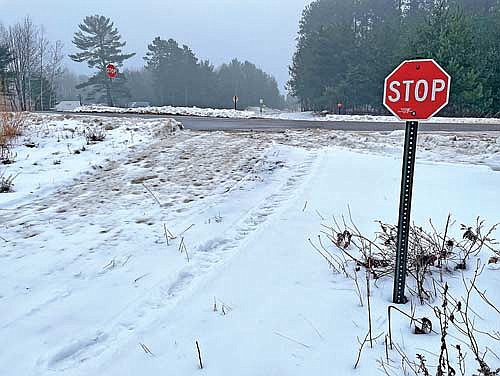 A snowmobile trail just outside the city of Rhinelander is pictured the morning Friday, Jan. 26. A lack of snow during the winter has kept trails closed in the Northwoods most, if not all, winter. There does not appear to be any relief on the immediate horizon, either, with the National Weather Service office in Green Bay forecasting above freezing high temperatures this week and no significant snowfall chances. (Photo by Jeremy Mayo/River News)