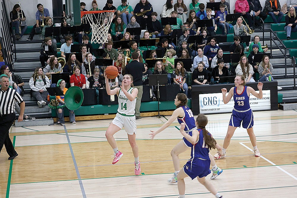 Rhinelander’s Lily Treder drives in for a layup during the first half of a GNC girls’ basketball game against Northland Pines at the Jim Miazga Community Gymnasium Friday, Jan. 26. Treder scored a game-high 23 points as the Hodags defeated the Eagles, 64-50. (Bob Mainhardt for the River News)