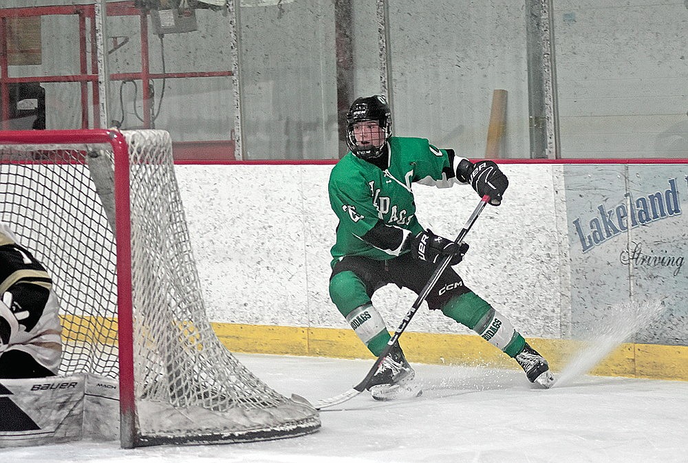 Rhinelander’s Drake Nelson controls the puck during the second period of a GNC boys’ hockey tournament game in Minocqua Tuesday, Jan. 30. (Brett LaBore/Lakeland Times)