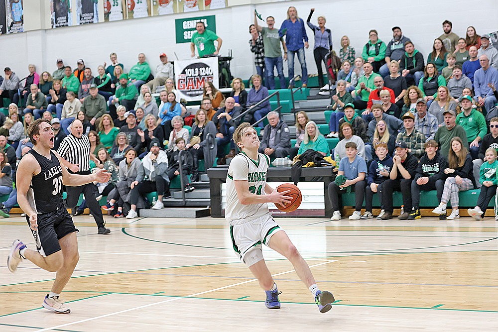 Rhinelander’s Will Gretzinger drives in for a layup late in the second half of a GNC boys’ basketball game against Lakeland at the Jim Miazga Community Gymnasium Friday, Feb. 9. Gretzinger scored a game-high 25 points as the Hodags defeated the T-Birds, 65-55. (Bob Mainhardt for the River News)