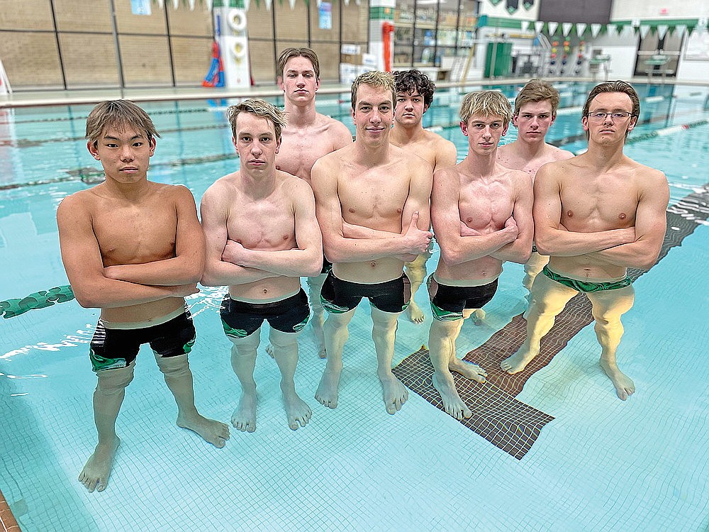 The Rhinelander High School boys’ swim team’s state qualifying squad poses for a photo prior to practice at the Heck Family Community Pool Monday, Feb. 12. Pictured, from left to right, are Charlie Antonuk, Judson O’Malley, Mathias Fugle, Dolan O’Malley, Samson Shinners, Shawn Denis, Brock Arrowood and Zacha King. Rhinelander, the defending WIAA Division 2 state champion, is projected to finish second at the state meet tonight in Waukesha. (Jeremy Mayo/River News)