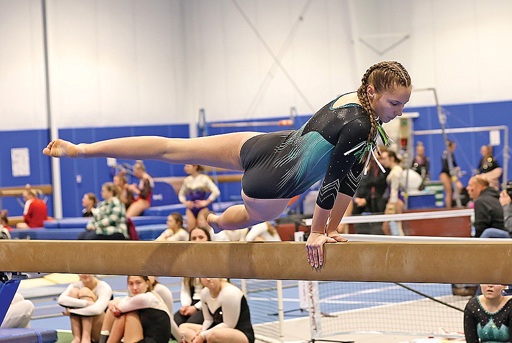 Rhinelander’s Samantha Aschenbrenner performs on the balance beam during the GNC Small meet at the YMCA of the Northwoods Saturday, Feb. 17. She finished fourth in the event. (Bob Mainhardt for the River News)