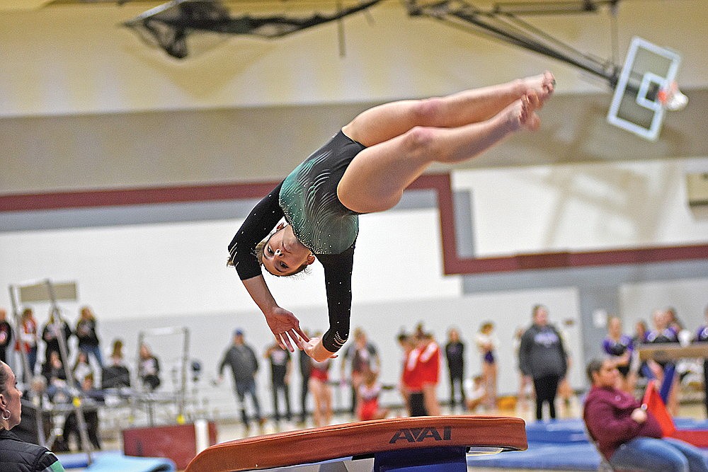 Rhinelander’s Alexis Smith performs her vault during a WIAA Division 2 gymnastics sectional meet in Antigo Friday, Feb. 23. Smith placed sixth in the event, missing a qualifying spot in the WIAA state meet by one spot. She will be an alternate in the event any of the top five finishers cannot compete at state. (Brett LaBore/Lakeland Times)