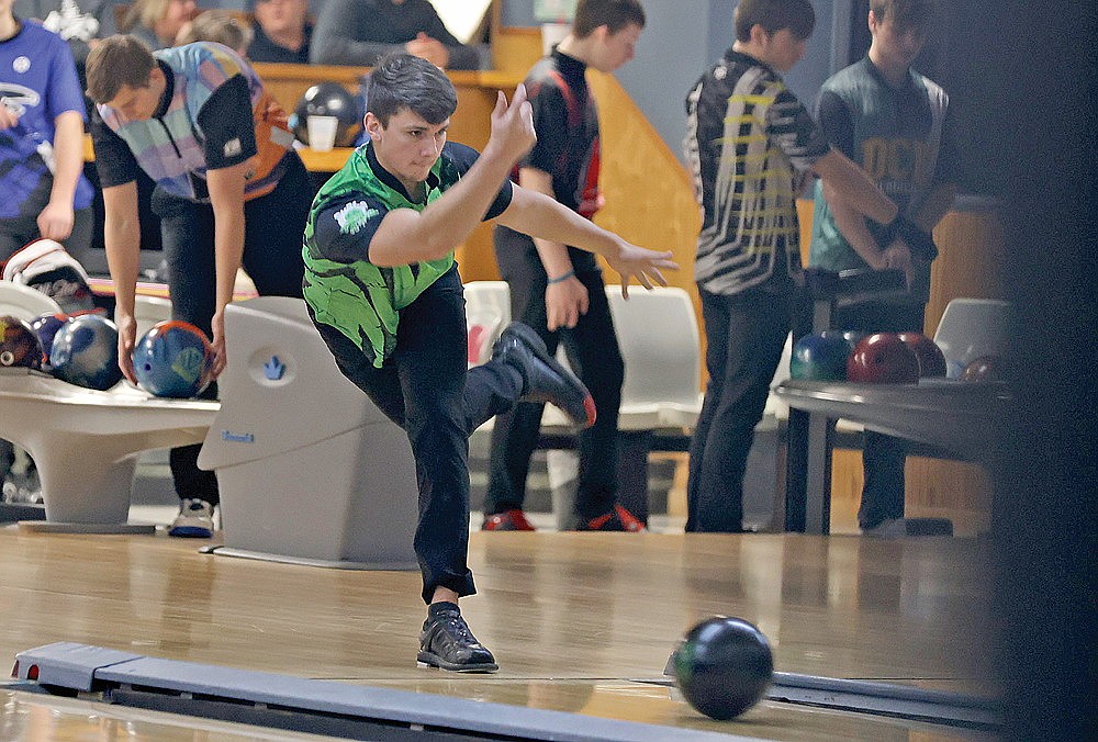 Noah Pearson bowls during the WiHSBC District 9 Singles competition at Nick’s Hodag Lanes in Rhinelander Sunday, Feb. 25. Pearson, a senior on the Rhinelander/Tomahawk boys’ team, was the overall winner of the tournament with a 908 series. (Bob Mainhardt for the River News)