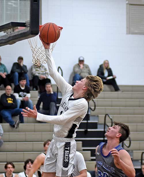 In this Jan. 23, 2024 file photo, Danny Gahler rises for a layup attempt in the second half against Three Lakes at Ted Voigt Court in Minocqua. Gahler was named first team all-conference, Lakeland’s first first-teamer in five years. (Photo by Brett LaBore/Lakeland Times)