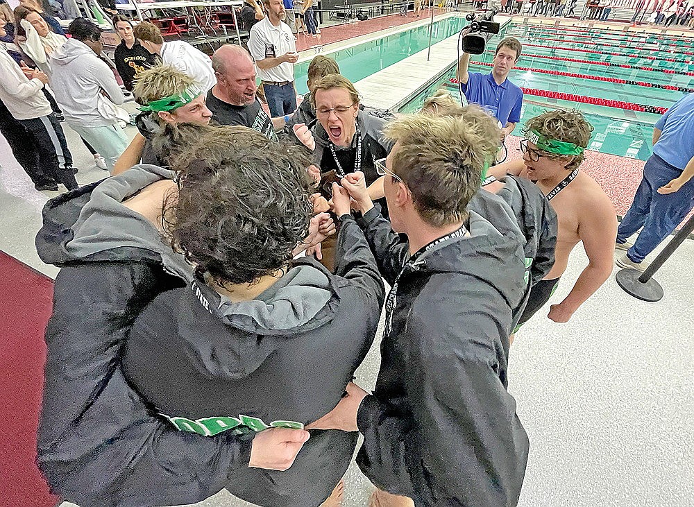 The Rhinelander High School boys’ swim team, led by senior Zacha King, huddles after finishing second in the WIAA Division 2 state meet in Waukesha Friday, Feb. 16. The Hodags showed their 2023 state championship was no fluke, finishing second at state this year despite graduating six seniors off of last year’s roster. (Jeremy Mayo/River News)