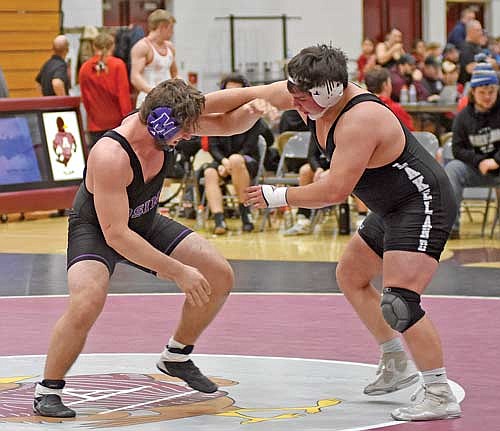 In this Jan. 18, 2024 file photo, Leonard Chosa, right, takes on Mosinee’s Bruce Hintz during a GNC quad at Sheldon Fieldhouse in Antigo. Chosa finished second team all-conference at the 215-pound class and will wrestle at the University of Wisconsin-Oshkosh next year. (Photo by Brett LaBore/Lakeland Times)