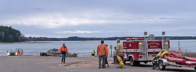 Emergency service and law enforcement personnel and equipment at the Willow Flowage’s Sandy Landing on Thursday, March 7 during the rescue of two ice fishermen on the flowage after they broke through the ice. (Photo by Trevor Greene/Lakeland Times)