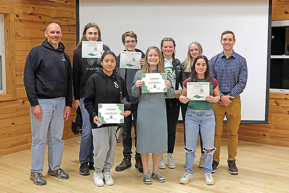 Members of the Hodag Nordic high school team poses with their certificates following the team’s banquet that the Cedric A. Vig Outdoor Classroom Wednesday, March 6. Pictured in the front row, from left to right, are Maria Hubler, Emma Mankus and Brynn Teter. In the back row arch coach John Gillen, Charlie Loomis, Iain Rumney, Mya Gillen, Lucy Eddy and head coach Andrew Seaman. Skiers Kayla Skubal, Kali Skubal, Luna Grage and Jonathan Calhoun were unavailable for the photograph. (Jeremy Mayo/River News)