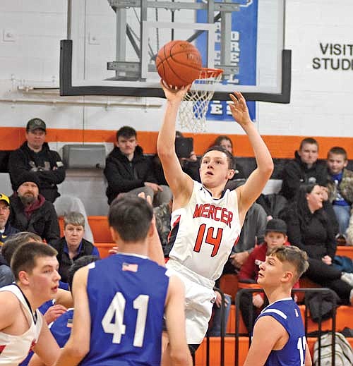 In this Feb. 16, 2024 file photo, Laken Walker attempts a shot in the first half against Mellen at Coach Leverson Court in Mercer. Walker was named Northern Lights honorable mention all-conference. (Photo by Brett LaBore/Lakeland Times)