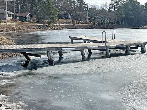 The dock at the Schoolhouse Bay landing encountered structural damage underneath due to shifting ice this winter on Minocqua Lake. (Photo by Trevor Greene/Lakeland Times)