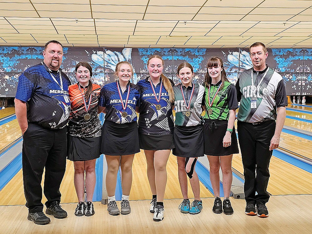 The District 9 girls’ All-Star Team poses for a photograph after winning the WiHSBC All Star Team Challenge in Green Bay Saturday, March 9. Pictured, from left to right, are coach Brad Krueger of Merrill, Morgan Bushman of Marshfield, Peyton Smith of Merrill, Marley Krueger of Merrill, Holly Orgeman of Wittenberg-Birnamwood, Johanna Dellenbach of Rhinelander and coach Chris Orgeman of Wittenberg-Birnamwood. Seeded third through qualifying, D9 beat District 10 and District 7A in the stepladder bracket to win the championship. (Cory Dellenbach/submitted)