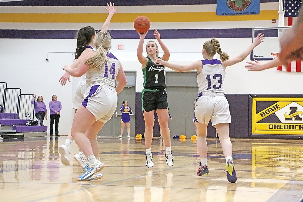 In this Dec. 28, 2023 file photo, Rhinelander’s Aubryn Clark attends a pull-up jump shot over a trio of Ashland defenders during the second half of a non-conference girls’ basketball game at Ashland Thursday, Dec. 28. Clark scored a season-high 41 points in the contest and led Rhinelander as a freshman, averaging 20.1 points per game. (Jeremy Mayo/River News)