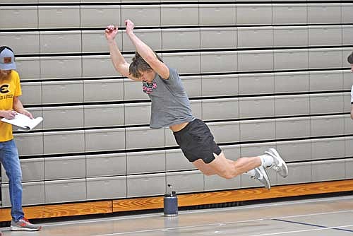 Maccoy Holmquist tests his broad jump during the first day of practice Monday, March 4 at the Lakeland Union High School fieldhouse in Minocqua. Holmquist is primed to be one of Lakeland’s top sprinters. (Photo by Brett LaBore/Lakeland Times)