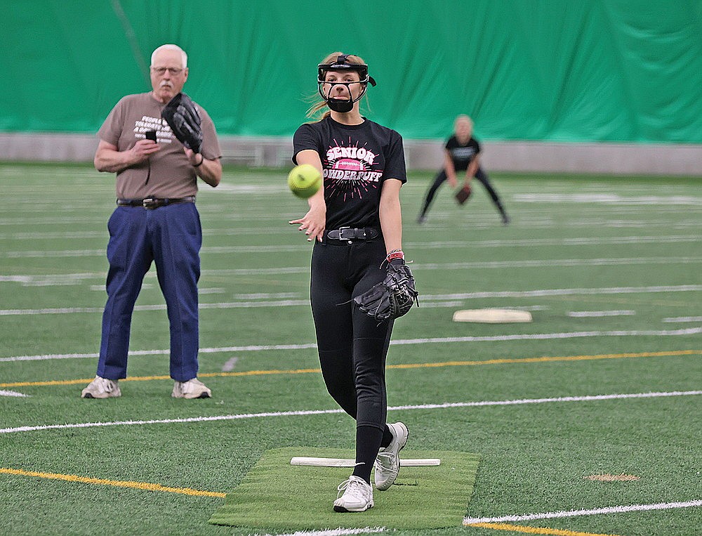 Laney Haenel pitches during Rhinelander High School softball practice in the Hodag Dome Monday, March 18. Haenel, a senior, is one of four pitchers vying for innings in the circle after the team graduated ace Addi DeMeyer off of last year’s team. (Bob Mainhardt for the River News)