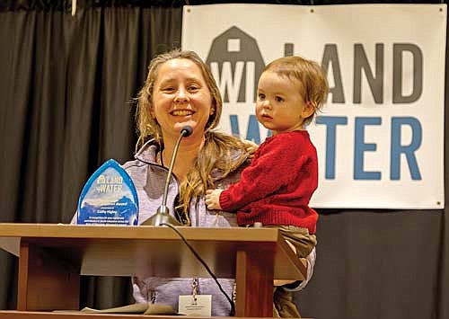 Cathy Higley and her daughter Ivy while accepting an award for being an outstanding conservation educator. (Contributed photograph)