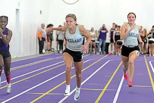 Kieran Petrie crosses the finish line in first place in the 60-meter dash during the Oredocker Large School Indoor Invite Tuesday, March 19 at Ashland High School. Petrie also placed second in the 400-meter dash. (Photo by Jeremy Mayo/River News)