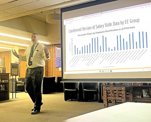 Lakeland Union High School district administrator Bob Smudde presents a staff compensation plan to the board of education on Monday, March 18, in Minocqua. (Photo by Trevor Greene/Lakeland Times)