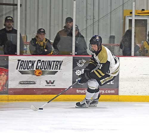 In this Nov. 30, 2023 file photo, Jack Rubo controls the puck against Mosinee at Lakeland Ice Arena in Minocqua. An injury limited Rubo to 10 games where he totaled five goals, five assists and 10 points. (Photo by Brett LaBore/Lakeland Times)