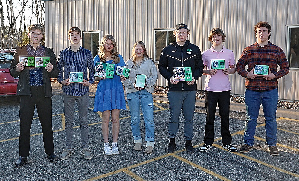 Rhinelander High School wrestling team award winners pose for a photograph following the team’s banquet at the Crescent Town Hall Saturday, March 23. Pictured, from left to right, are Logan Schwinger, Avrom Barr, Mya Swanson, Taylor Dahlquist, Owen Kurtz, Gage Anderson and Reid Schultz. Award winner Lillian Badger was unavailable for the photograph. (Bob Mainhardt for the River News)