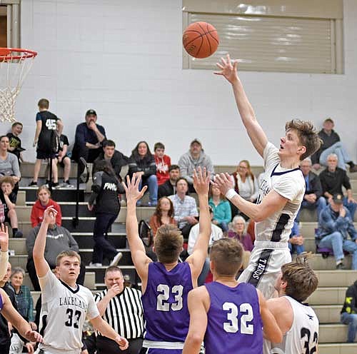 In this Feb. 22, 2024 file photo, Hakken Berklund makes a running floater in the second half against Mosinee at Ted Voigt Court in Minocqua. Berklund finished honorable mention all-conference. (Photo by Brett LaBore/Lakeland Times)