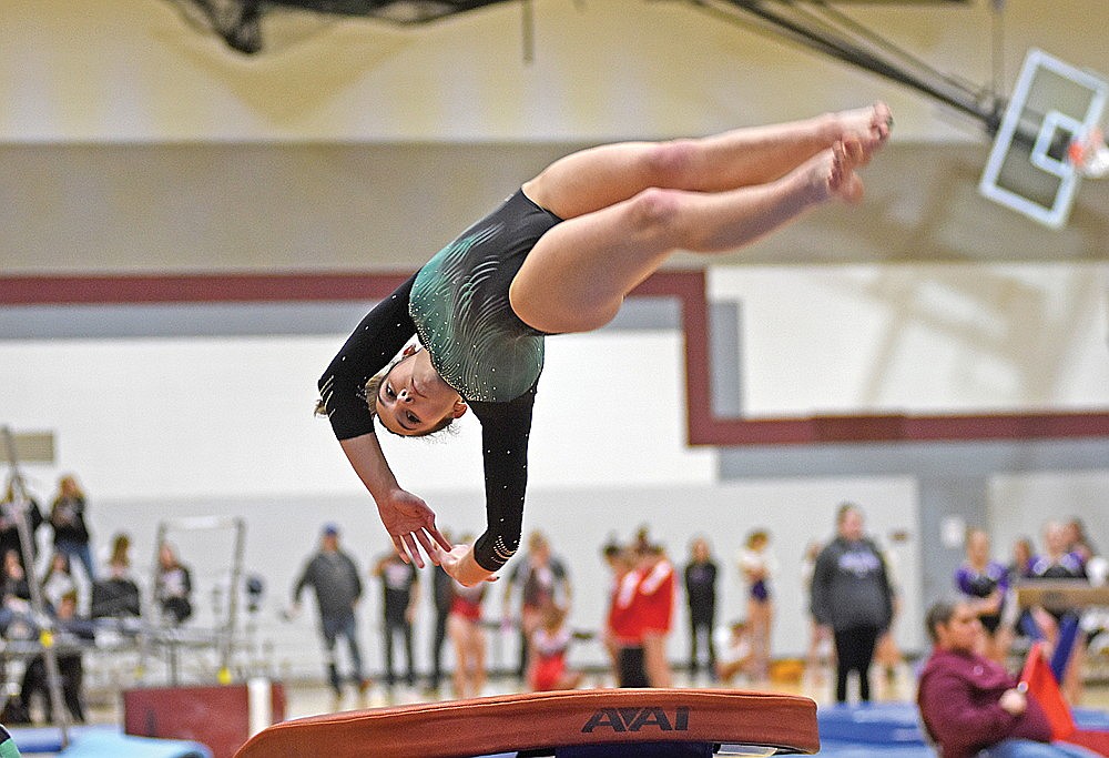 In this Feb. 23, 2024 file photo, Rhinelander’s Alexis Smith performs her vault during a WIAA Division 2 gymnastics sectional meet in Antigo. Smith placed sixth in the event and qualified for the WIAA state meet as an alternate, giving Rhinelander its first individual state qualifier in three years. (Brett LaBore/Lakeland Times)