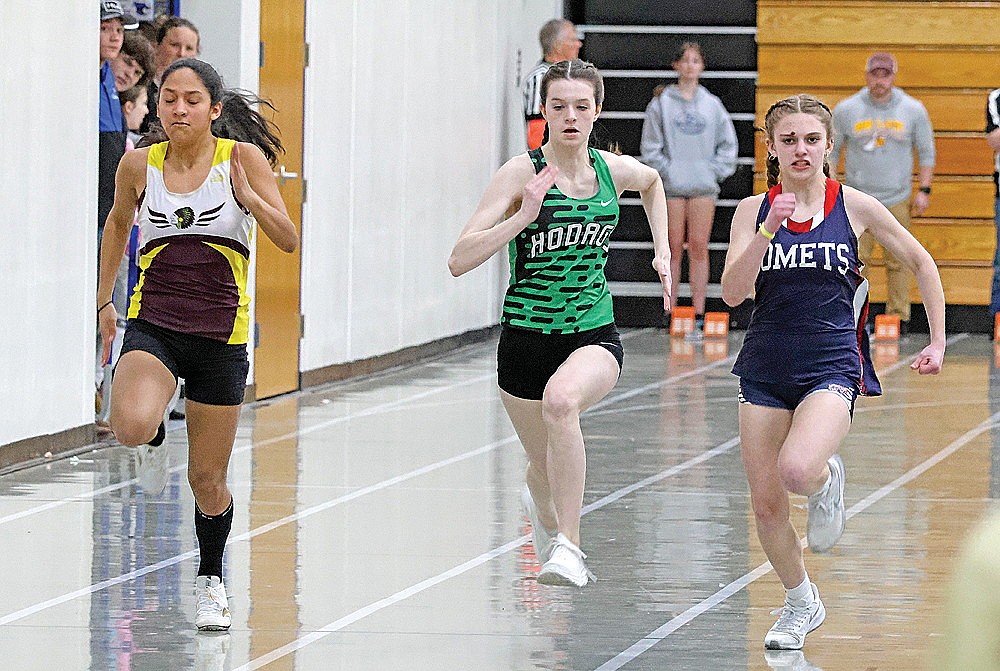 Rhinelander’s Olivia Ruetz, center races Rib Lake’s Olivia Lopez, left, and Waupaca’s Olivia Wilson, right, in the finals of the 50-meter dash during the Bluejay Indoor Invitational in Merrill Thursday, March 28. Ruetz finished second in the event and the Hodags won the meet, edging out Merrill by five points for the title. (Matt Frey/Star New)