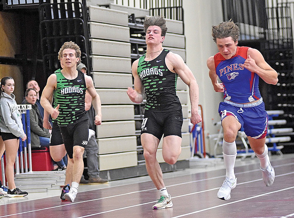 Rhinelander’s Ben Olson, left, and Zach Germain, center, race Northland Pines’ Eli Kerner during the Northland Pines Indoor Invite track meet in Eagle River Thursday, April 4. Germain and Olson finished second and sixth in the event. (Brett LaBore/Lakeland Times)