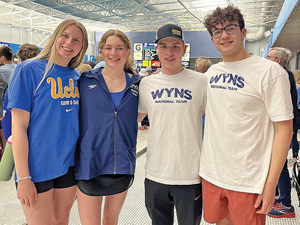 Rhinelander swimmers, from left to right, Abi Winnicki, Ellyse Younker, Brock Arrowood and Samson Shinners stand on deck during the YMCA Short Course Nationals swim meet held in Greensboro, N.C. April 1-6. (Submitted photo)