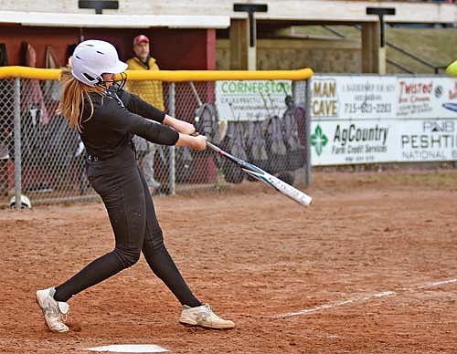 Saylor Timmerman homers to center field during the 10th inning of Lakeland’s 4-3 win over Antigo Tuesday, April 9 at Al Remington Ball Park in Antigo. Timmerman picked up the win in the circle with a career-high 23 strikeouts. (Photo by Brett LaBore/Lakeland Times)