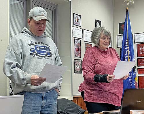 Ty Trapp and Judy Nelson were sworn in at the beginning of Monday’s meeting of the Arbor Vitae-Woodruff (AV-W) school board. Trapp was elected to the school board on April 2 and Nelson was re-elected to another term on the school board. (Photo by Brian Jopek/Lakeland Times)